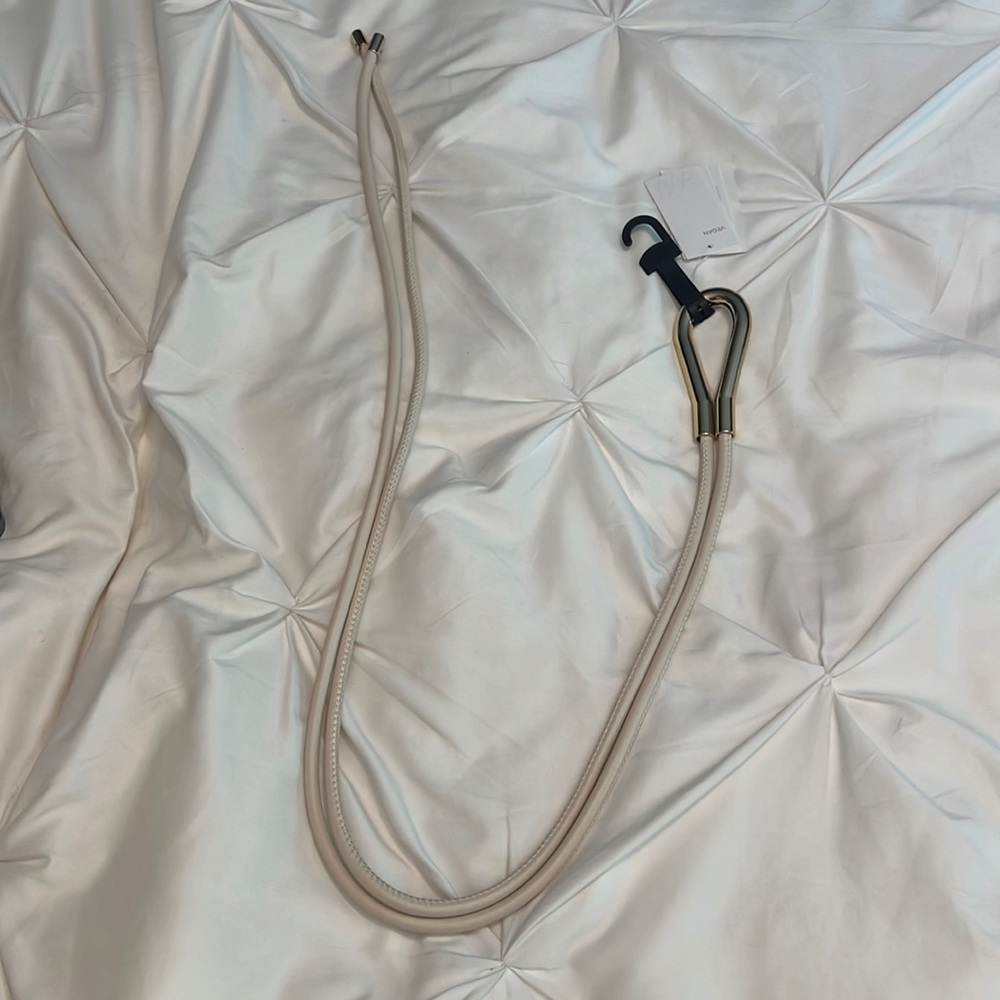 Waist belt made of two straps to thread through and tie around a metal look